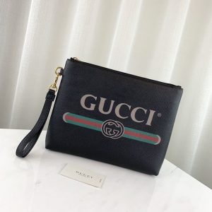 GUCCI PRINT LOGO POUCH<br>구찌 프린트 로고 파우치<br>[31.5x25cm 이태리가죽]